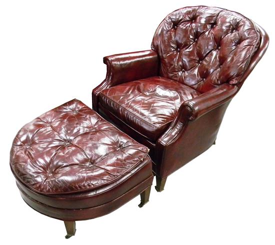 Appraisal: Leather chair and ottoman by Farington th C red-mahogany colored