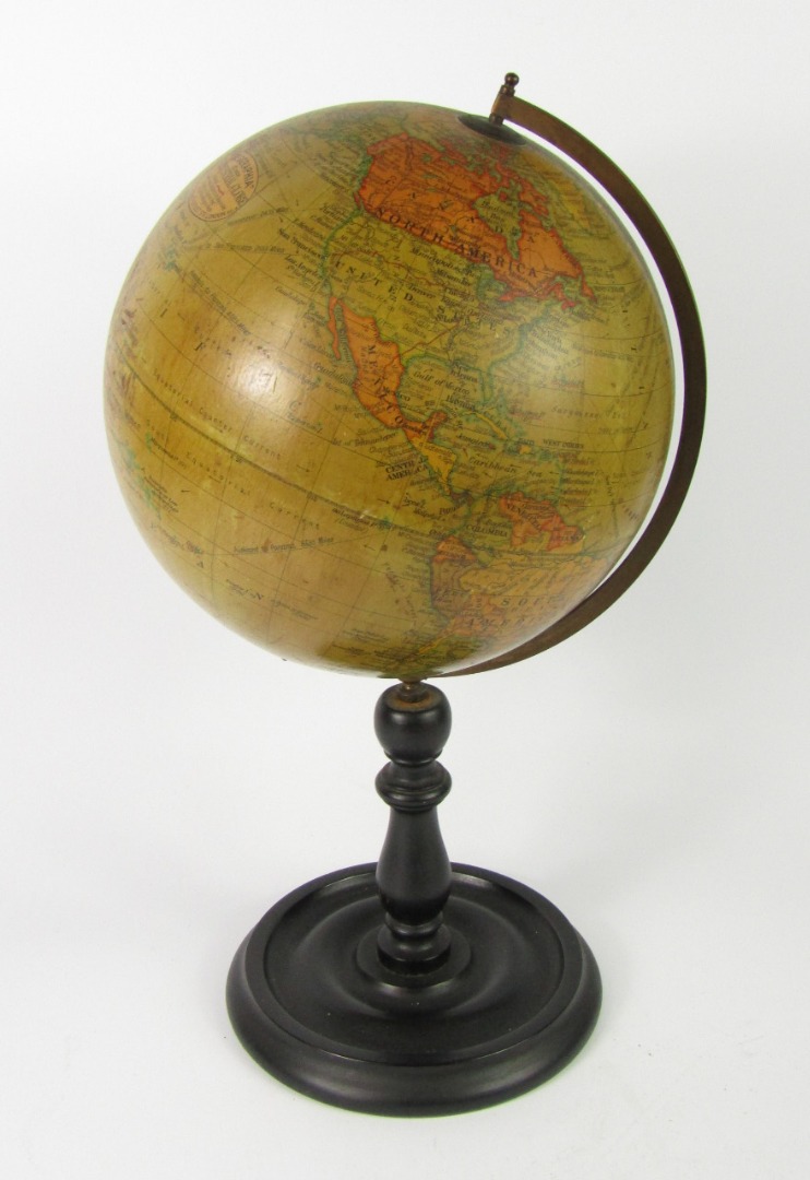 Appraisal: A Geographia inch terrestial globe on a turned wooden stand