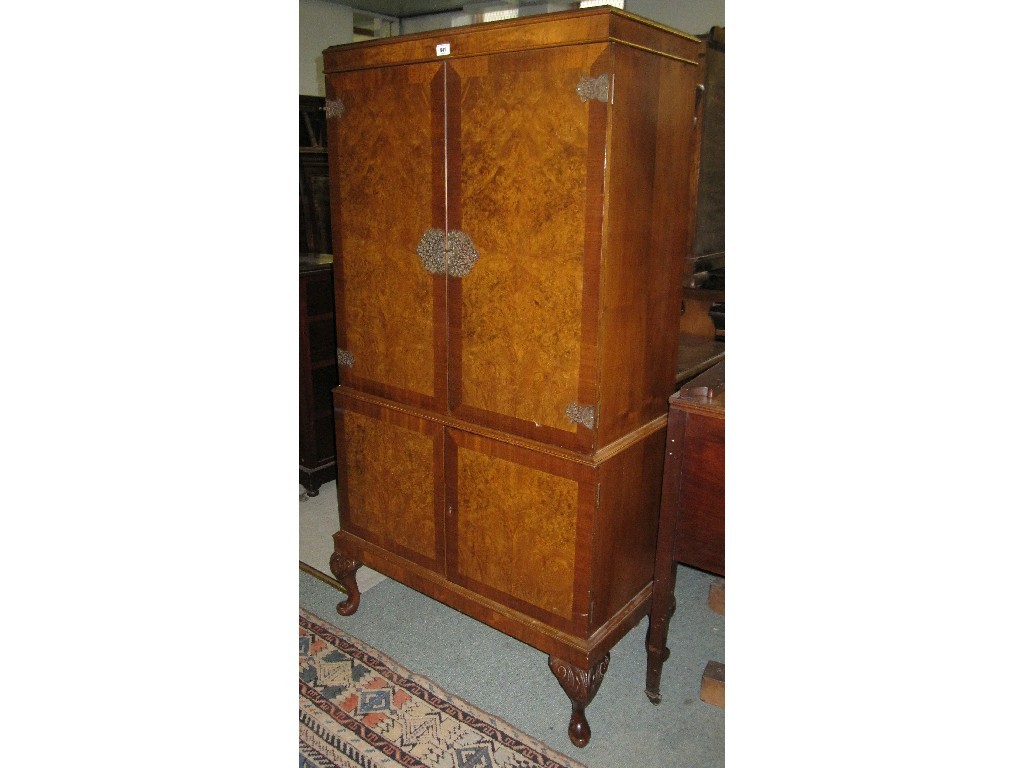 Appraisal: Walnut drinks cabinet