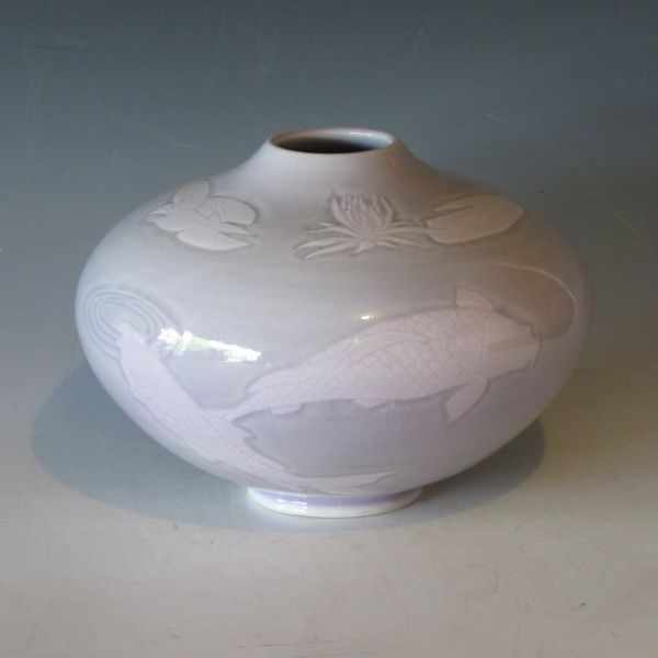 Appraisal: Door Pottery porcelain vase with hand decorated koi in a