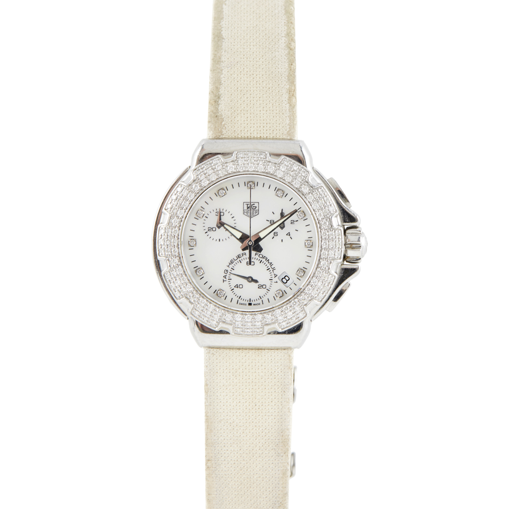 Appraisal: TAG HEUER - A lady's diamond set chronograph Formula diamond