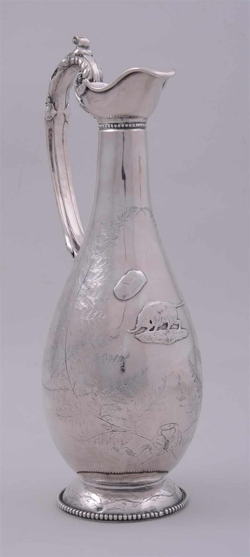 Appraisal: ENGRAVED STERLING WINE JUG Marked Fondar and sterling the pear-form