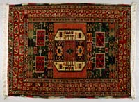 Appraisal: TURKISH SHIRVAN ORIENTAL SCATTER RUG The central geometric medallion mat