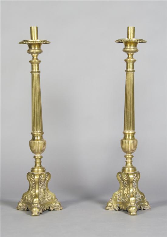 Appraisal: A Pair of Brass Pricket Sticks Height inches