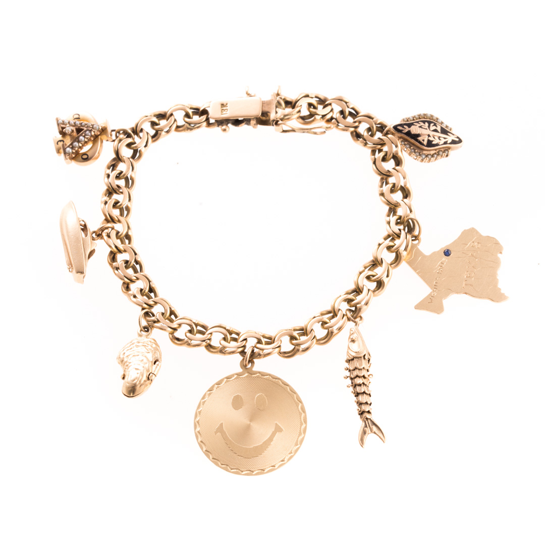 Appraisal: A K Charm Bracelet with Charms K yellow gold double