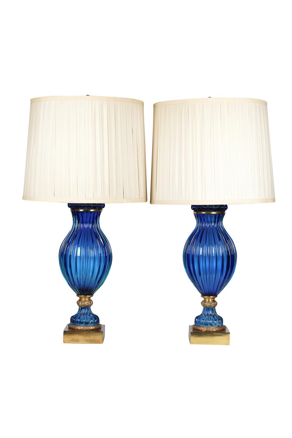 Appraisal: PAIR OF BLOWN GLASS AND GILT METAL MOUNTED TABLE LAMPSlamps