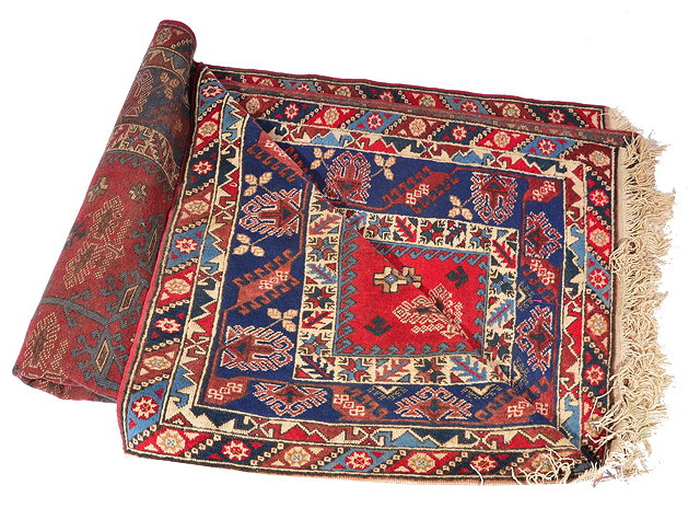 Appraisal: A TURKISH CAUCASIAN DESIGN SMALL CARPET with all over geometric