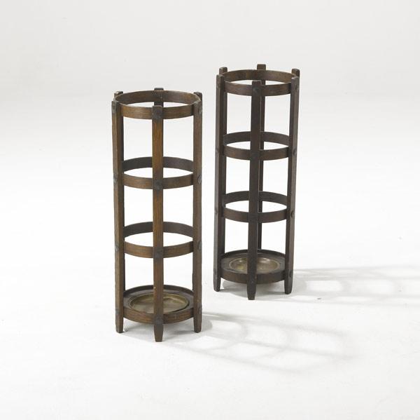 Appraisal: STICKLEY BROS Two umbrella stands with iron fasteners and brass