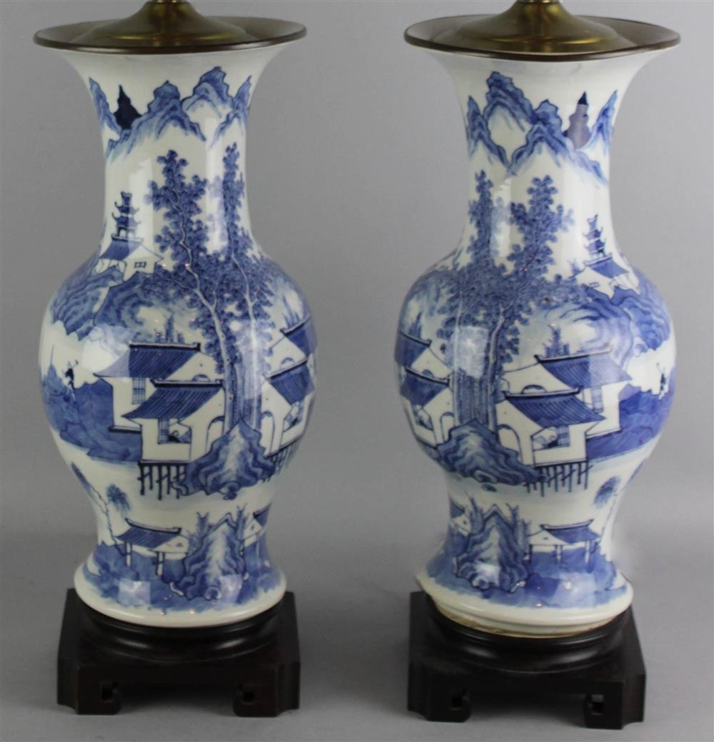 Appraisal: PAIR OF JAPANESE UNDERGLAZE BLUE AND WHITE BEAKER VASES of