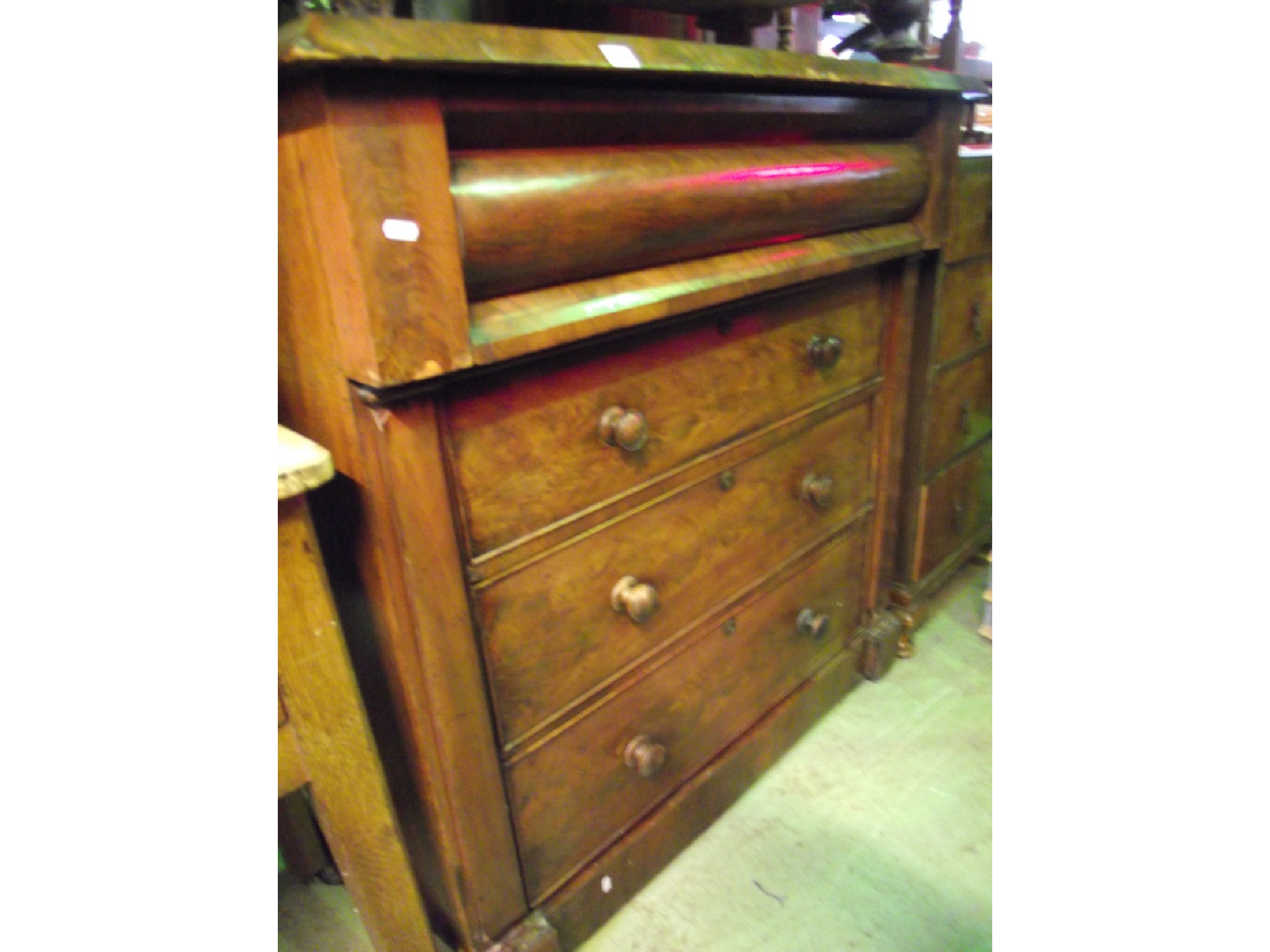 Appraisal: A Victorian mahogany bedroom chest of four long drawers flanked