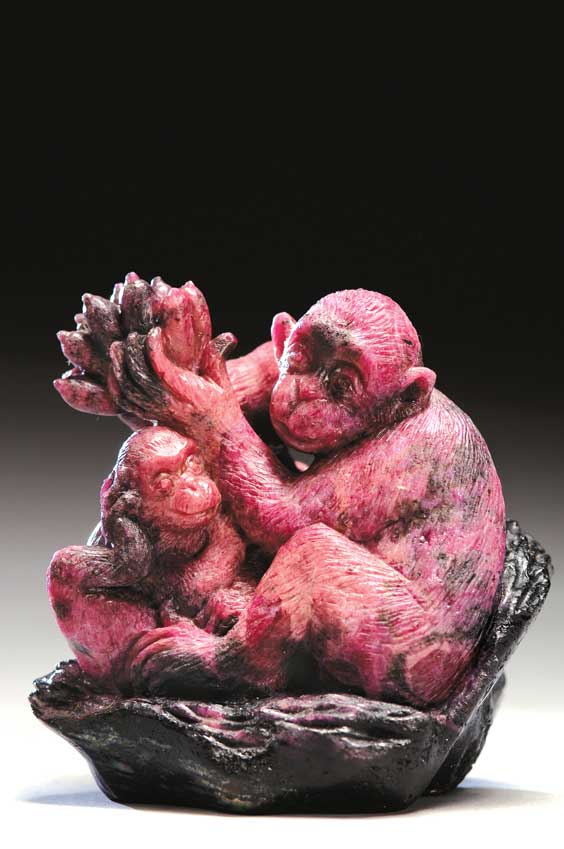 Appraisal: RUBY IN ZOISITE MONKEYS Finely carved and charming ruby in