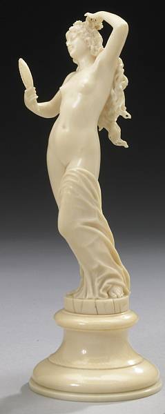 Appraisal: A French carved ivory figure of Vanity late th century