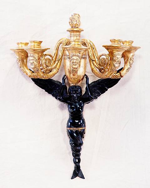 Appraisal: A pair of Louis XVI style giltwood and ebonized wall