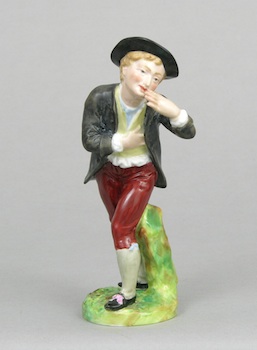 Appraisal: A Porcelain Figurine of a Boy A porcelain figurine of