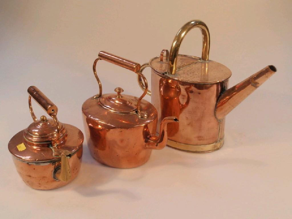 Appraisal: An Victorian copper watering can and two old copper kettles