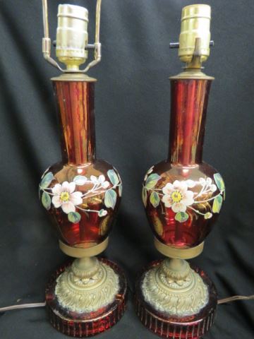 Appraisal: Pair of Enameled Cranberry Table Lamps fine floral body