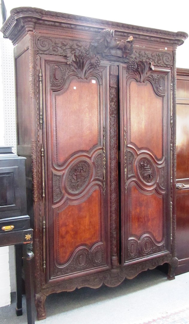 Appraisal: A late th century French carved oak two door armoire