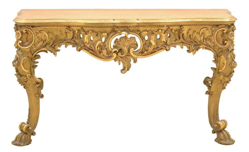 Appraisal: A LOUIS XV STYLE FOLIATE CARVED GILTWOOD CONSOLE Serpentine carved