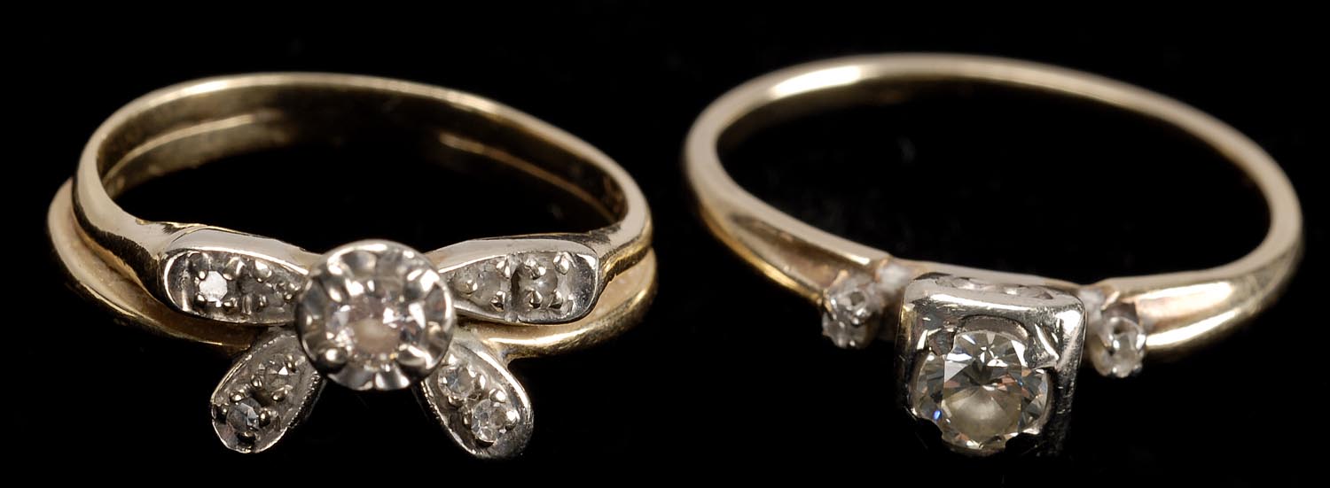 Appraisal: TWO DIAMOND AND YELLOW GOLD RINGS one with diamond solitaire