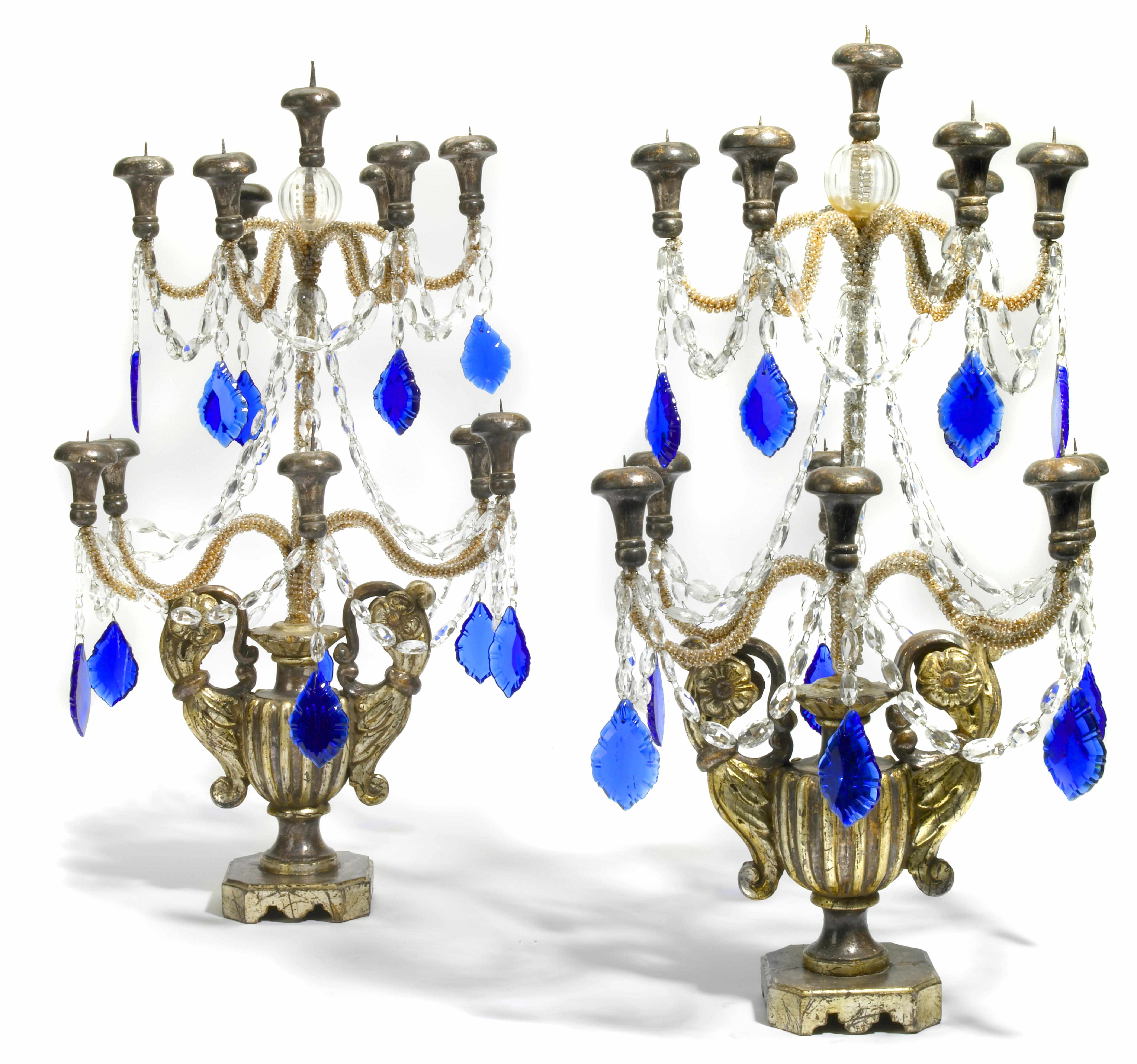 Appraisal: A pair of Italian Baroque style silvered wood and glass