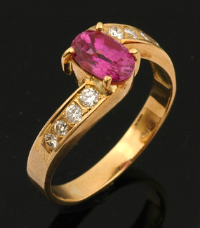 Appraisal: CT GOLD PINK SAPPHIRE AND DIAMOND DRESS RING DIAMONDS TOTALLING