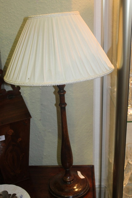 Appraisal: AN EDWARDIAN STAIN MAHOGANY AND BEECHWOOD TABLE LAMP with shade