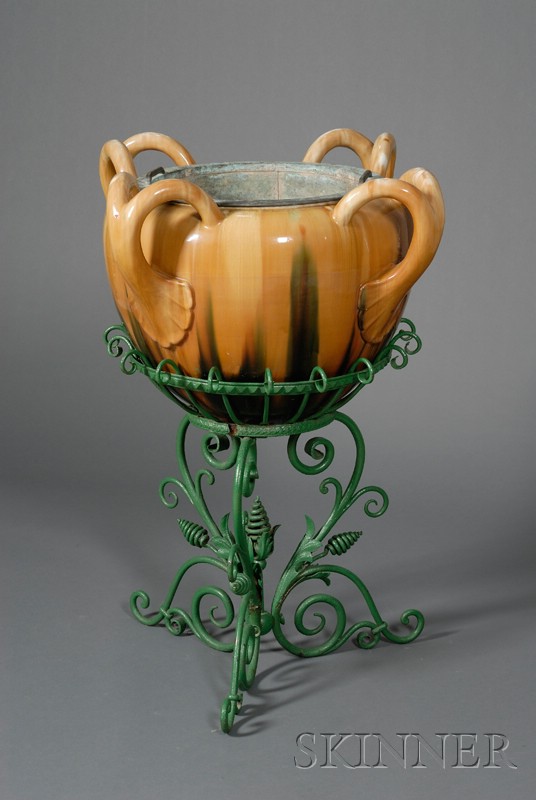 Appraisal: Large Spinach and Egg Glazed Terracotta Jardiniere on Wrought-iron Stand