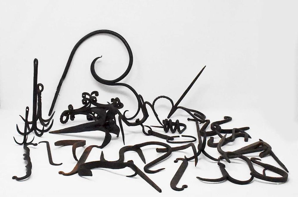 Appraisal: pieces of hand wrought iron pieces of hand wrought iron