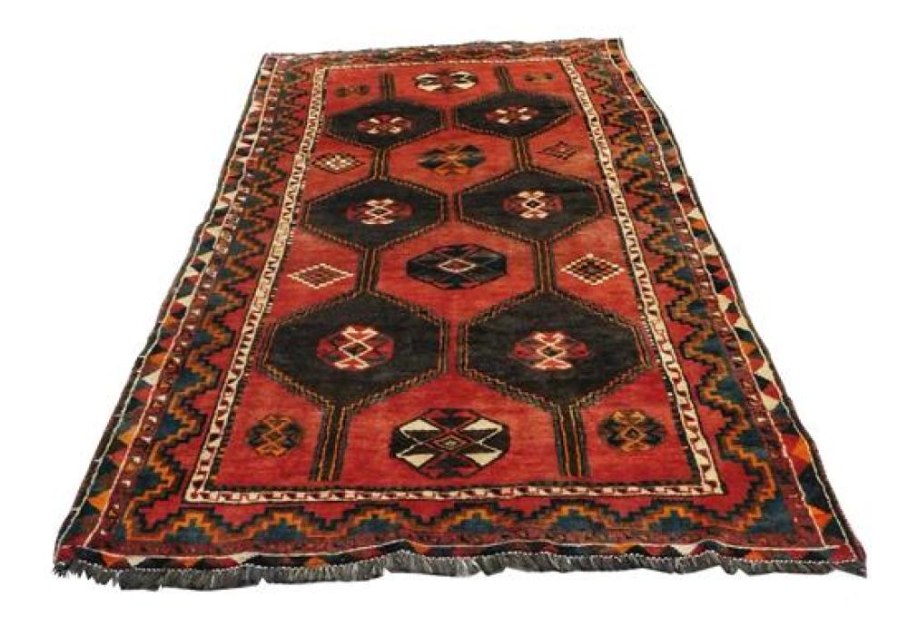 Appraisal: RUG Semi-antique Shiraz ' x ' hand-knotted wool polychrome geometric