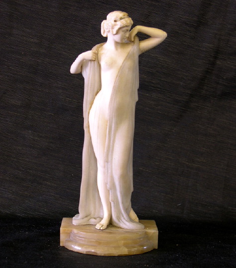 Appraisal: Good Continental Carved Ivory and Alabaster Figure depicting a disrobing