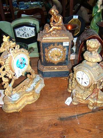 Appraisal: A th Century French gilt metal mantel clock surmounted with