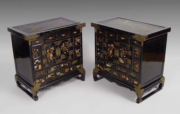 Appraisal: PAIR OF BLACK LACQUER CHINESE NIGHT STANDS Four drawer over