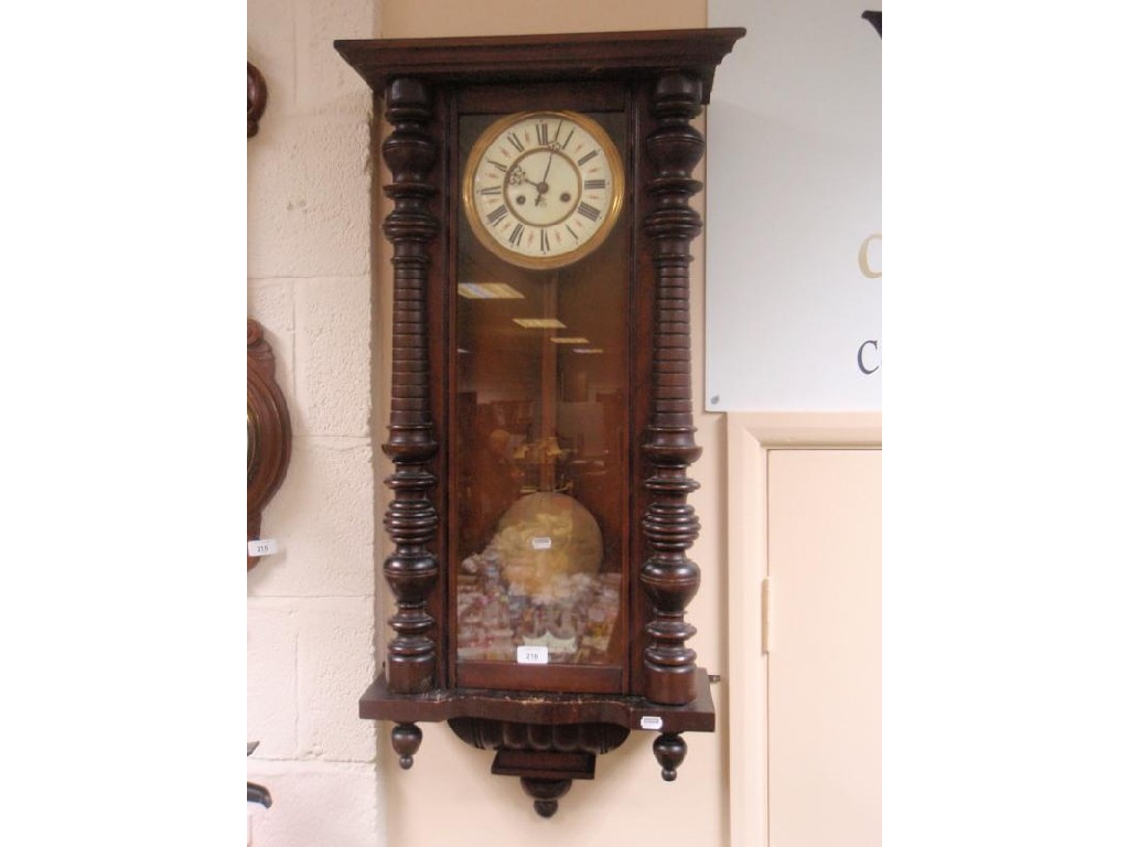 Appraisal: An early thC German beech cased wall clock of eight-day