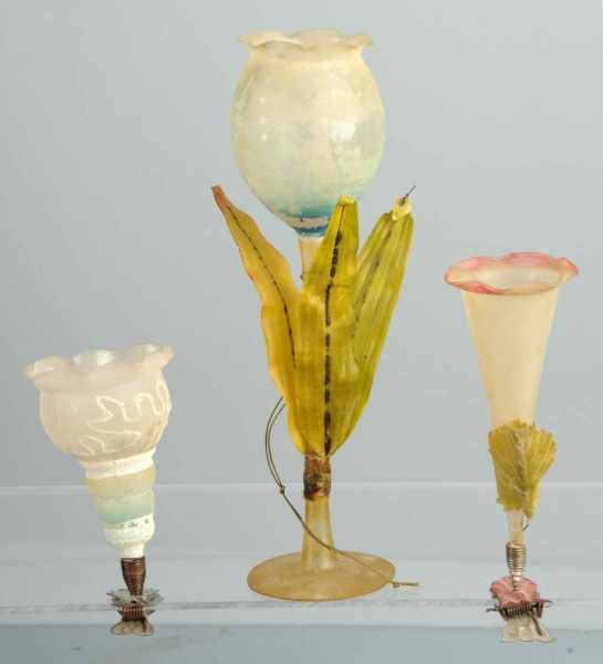 Appraisal: Lot of Blown Glass Flower Vases Description Includes two clip-ons