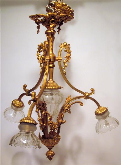 Appraisal: French four-light three-arm gilt bronze chandelier early th century