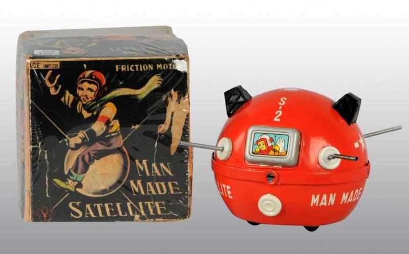 Appraisal: Tin Man-Made Satellite Friction Toy Description Japanese Working Made by