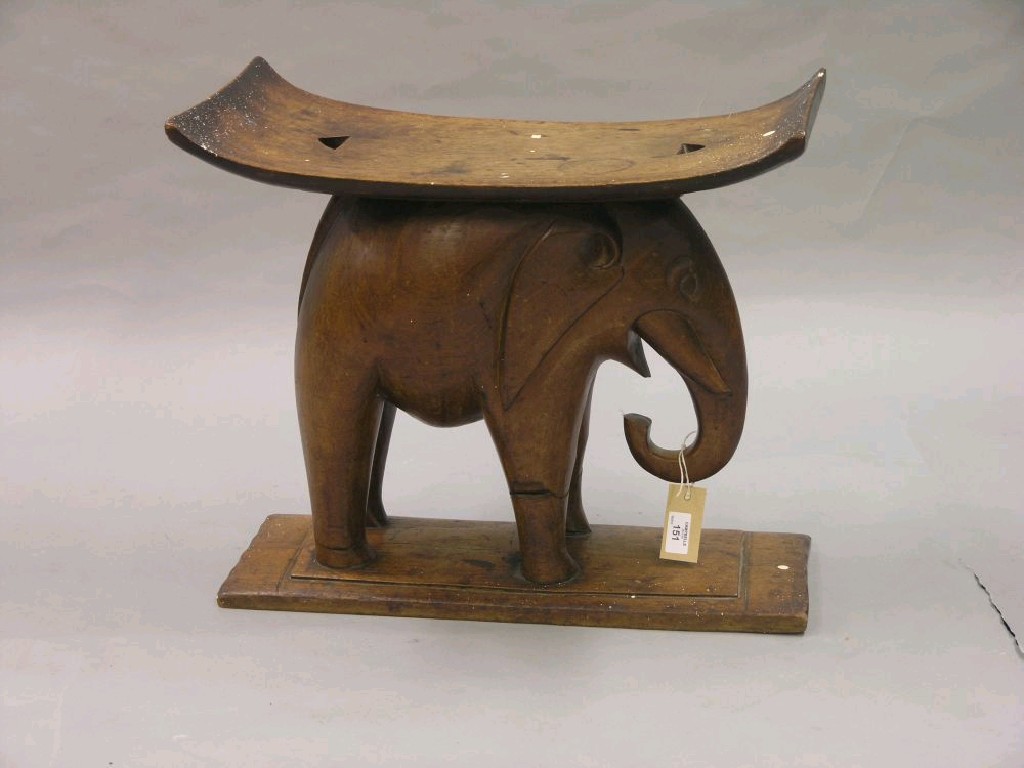 Appraisal: An early th century African tribal elephant stool saddle-seat elephant