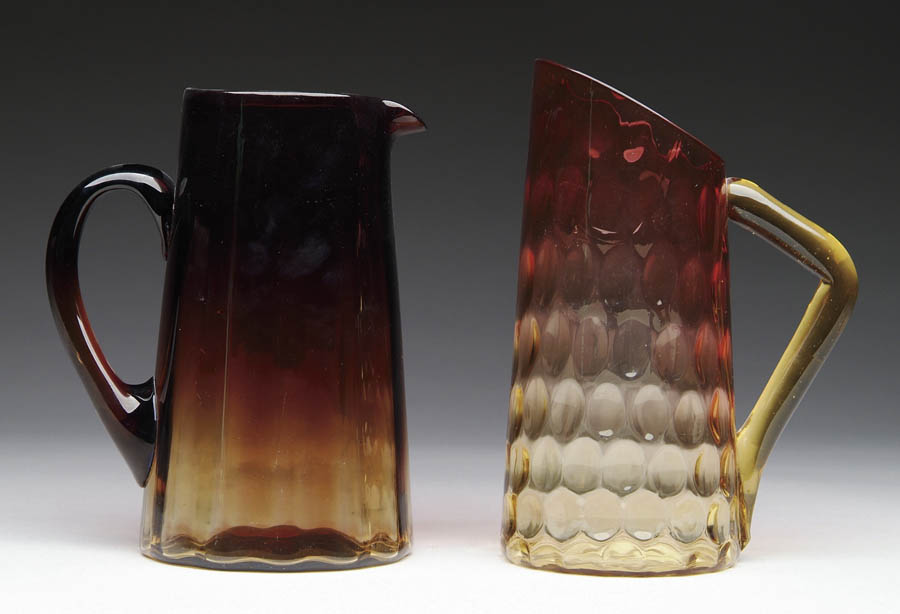 Appraisal: TWO AMBERINA PITCHERS Rich colored Amberina pitcher has light vertical