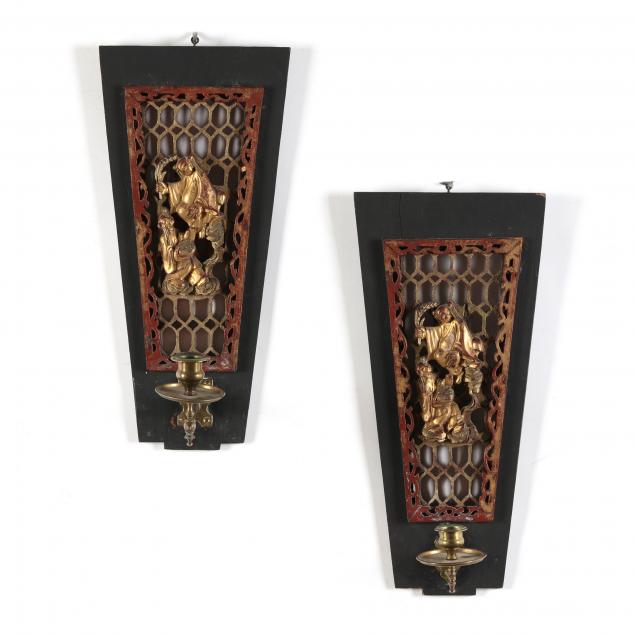 Appraisal: A PAIR OF CHINESE CARVED PAINTED AND GILDED WOOD SCONCES