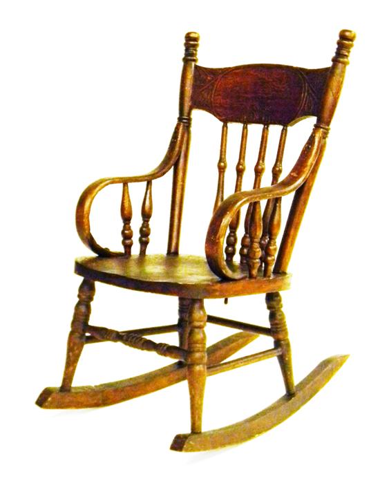 Appraisal: Child's rocking chair turned legs stretchers and spindles headboard decorated