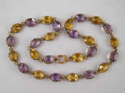 Appraisal: An antique vintage carat gold citrine and amethyst necklace stones