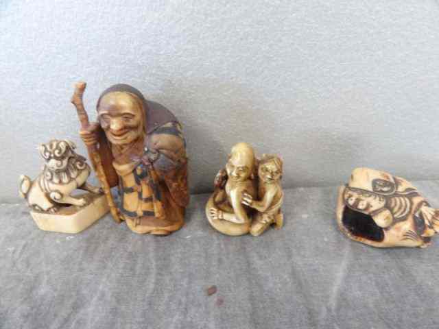 Appraisal: Small Asian Ivories Old man holding a cane and beads