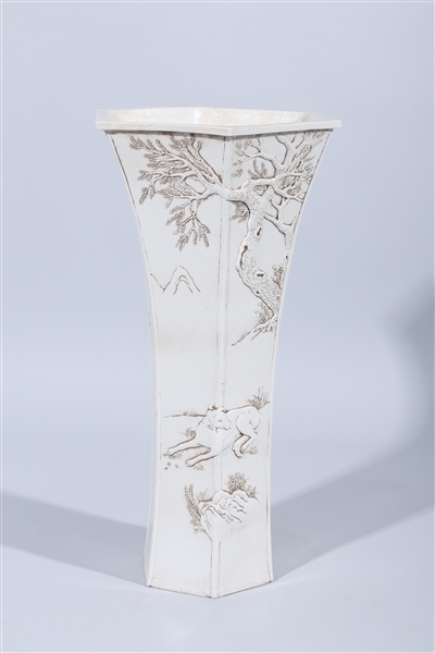 Appraisal: Chinese porcelain tall six-sided white vase with dog designs in