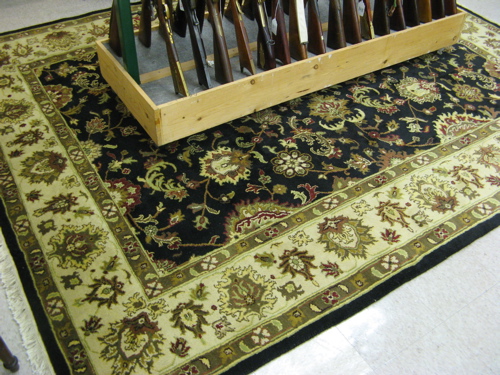 Appraisal: HAND KNOTTED ORIENTAL CARPET Indo-Persian overall floral design on rectangular