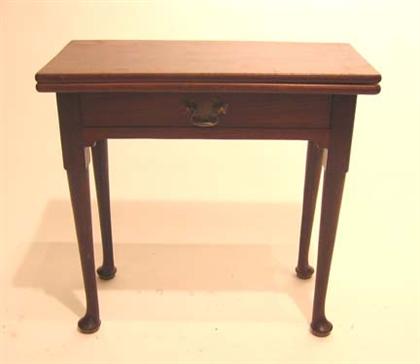 Appraisal: George II mahogany tea table circa The fold-over rounded rectangular