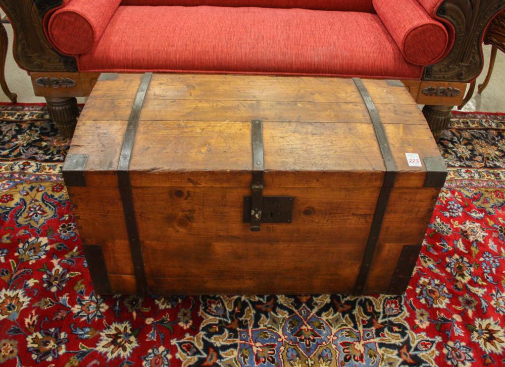 Appraisal: LIFT-TOP PINE IMMIGRANT CHEST th century with forged iron hardware