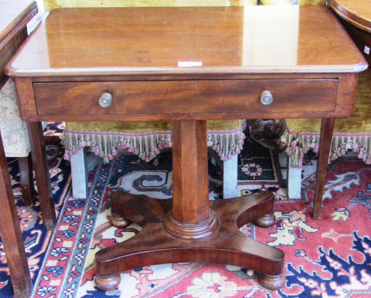 Appraisal: A William IV mahogany single drawer side table on quatrefoil