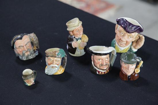 Appraisal: SEVEN MINIATURE ROYAL DOULTON CHARACTER MUGS England th century ''Merlin''