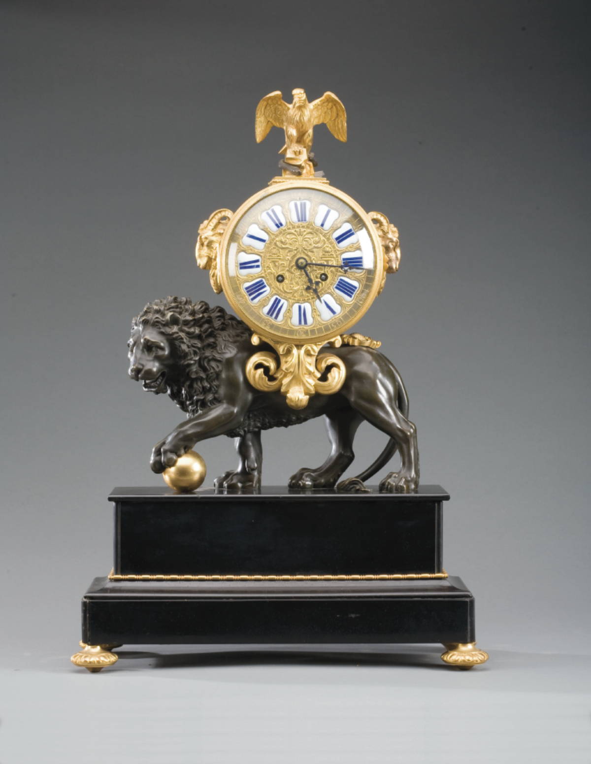 Appraisal: NAPOLEON III PATINATED AND GILT-BRONZE FIGURAL CLOCK The circular dial