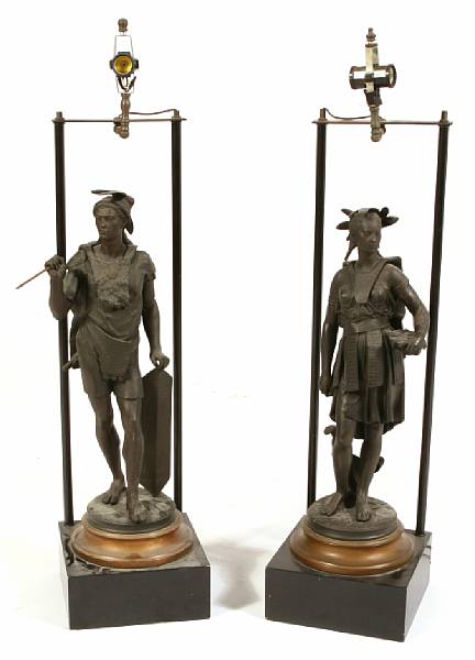 Appraisal: A pair of patinated metal figural table lamps height to